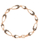 Add some glitter and glam to your look. Genevieve & Grace's pretty hammered link bracelet features sparkling marcasite in 18k rose gold over sterling silver. Approximate length: 7-1/2 inches.