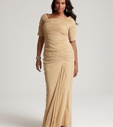 An elegant short-sleeved silhouette lends flattering appeal to this red carpet-worthy gown from Tadashi Shoji Plus.