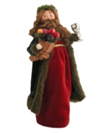 Haunting Scrooge with scenes of deprivation, the Spirit of Christmas Present inspires hope for a  better future. A lavish fellow, the Byers' Choice figurine wears a fur-lined coat and carries a cornucopia of fruit with a chalice of wine.