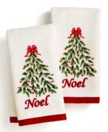 Give your bath a touch of holiday spirit. Featuring a decorated Christmas tree, glitter accents and a cheerful red border, this Lenox fingertip towel set is a stylish way to celebrate the season. (Clearance)