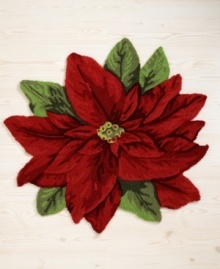 Evoking a traditional holiday feel, this Martha Stewart Collection accent rug features a poinsettia in festive red and green colors for a classic addition to your home.