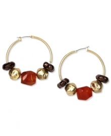 Shake up your style with Jones New York. These alluring hoops feature clusters of resin beads. Finished with a click-it closure. Crafted in worn gold tone mixed metal. Approximate diameter: 1-1/2 inches.