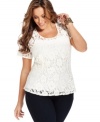 Sport some of the season's hottest trends with DKNY's lace plus size top, finished by a peplum waist.