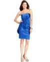 Vince Camuto's dress is sophisticated, strapless and decked out with a peplum-inspired tier at one hip.