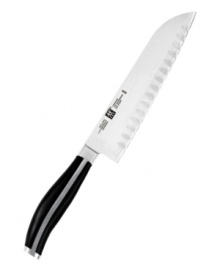 A sleek, versatile santoku that no serious cook can do without! Sturdy, hollow-edge blade is ideal for chopping large amounts. One-piece precision forging with retention and corrosion resistance for the ultimate in durability. Full tang handle without rivets. Ice-hardened. Twin logo on handle. Made in Solingen, Germany. Lifetime warranty.