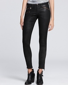 Luxe rag & bone/JEAN leather leggings are decked with zippers at the front for a cool-girl look with serious street credibility. A tissue-thin tee and ankle booties complete the style perfectly.