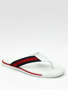 Leather thong sandal with signature blue/red/blue web detail and micro guccissima trim. Rubber sole Made in Italy 