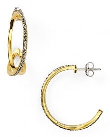 Have a golden moment with this pair of twisted hoop earrings from Judith Jack. Whether styled classically or paired with modern cuts, this pair will take you from desk to dinner with ease.