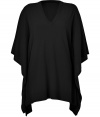 Instantly elevate off duty looks with this luxe black cashmere cape from Michael Kors - Easy, gently draped silhouette - Fashionable poncho style features a flattering v-neck,  pointed, asymmetric hems and butterfly-cut arm holes - Pair with skinny denim, cigarette pants or pencil skirts and ballet flats or ankle booties