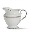 Metropolitan sensibility and modern design combine in this understated white bone china creamer from Lenox's collection of dinnerware and dishes. Platinum gild along the edge is enhanced by a clean, platinum geometric pattern reminiscent of architectural accents. Qualifies for Rebate