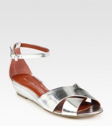 Mirrored metallic leather straps with a slight self-covered wedge and an adjustable ankle strap. Self-covered wedge, 1 (25mm)Metallic leather upperLeather lining and solePadded insoleImportedOUR FIT MODEL RECOMMENDS ordering true size. 