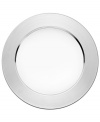 The glint of a stainless steel Sarpaneva plate is a chic surprise amid the standout dinnerware patterns of Iittala.