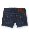 These fun cut-off shorts are easy to pair with multiple tops and the frayed hem gives her look a little sass.