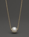 Cultured freshwater pearl necklace in yellow gold.