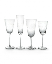 Savor your favorite beverage with the Larabee Dot goblet. Etched polka-dots on clear crystal lend elegance to your tabletop. Shown from left to right: goblet, flute, iced beverage glass and wine glass.