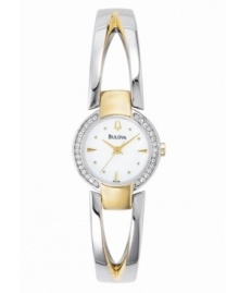 A two-toned, open-work bangle and sparkling crystal-studded bezel combine for eye-catching elegance. Features Mother of Pearl dial. Three-year limited warranty.