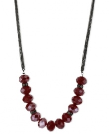 Paint the town red with this frontal necklace from Kenneth Cole New York. With chains crafted from hematite-tone mixed metal, red beads and glass crystal accents, the necklace is pleasing to the eye. Approximate length: 18 inches + 3-inch extender. Approximate drop: 1/2 inch.