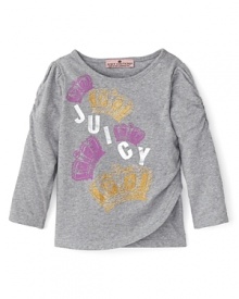 A myriad of colorful crowns dance around a silver signature Juicy logo on a soft gray tee with ruched sleeves.