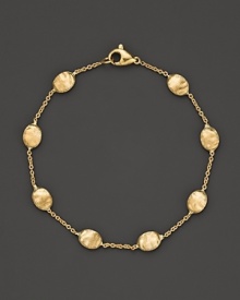 From the Siviglia collection, a bracelet with medium-sized beads, designed by Marco Bicego.