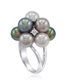 Get a fresh, new look in this chic cluster with a hint of shimmer. Majorica ring features multicolored, organic, man-made pearls (8 mm) and sparkling cubic zirconia accents. Ring crafted in sterling silver. Size 7-1/2.