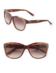 THE LOOKRound cat's-eye silhouetteAcetate framesMetal logo at temple UV protectionSignature case includedTHE COLORTortoise frames with striped detailing and brown gradient lensesORIGINMade in France