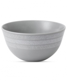 Effortlessly chic, the Simplicity soup and cereal bowl by Vera Wang Wedgwood features a minimalist shape in casual porcelain lined with neutral cream and gray.