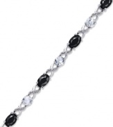 Embrace some glamour now and then. This pretty crisscross patterned bracelet highlights oval-cut onyx (3-1/3 ct. t.w.), round-cut white topaz (2-3/8 ct. t.w.) and sparkling diamond accents. Approximate length: 7-1/2 inches.