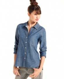 Pretty Rebellious updates the chambray button-down with a chic high-low hem! An essential piece for fall, this top wears well with any of the season's bold bottoms.