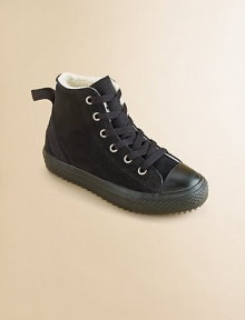 Classic Chuck Taylors in ultra-soft suede with cozy, faux shearling lining in a must-have high-top silhouette.Lace-up closureLeather upperFaux shearling liningRubber solePadded insoleImported