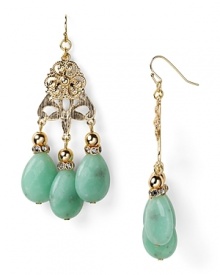 Gold medallions and faceted stones capture exotic casbah cool. Earrings by Lydell NYC.