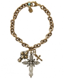 Crossover appeal. This charm bracelet from Lucky Brand features three cross charms, all crafted from gold- and silver-tone mixed metal, as well as turquoise bead for color. Approximate length: 7-1/2 inches.