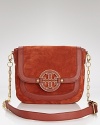 The perfectly slouchy messenger bag in buttery soft suede - every uptown girl needs one. Carry this Tory Burch crossbody for exemplary citified style.