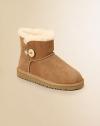 This mini version of the Bailey boot is a warm, plush and fuzzy dream come true for tiny feet.Logo button-and-loop closureSheepskin upperSheepskin liningMolded EVA sole is light and flexiblePadded insoleImported