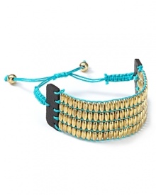 For haute hippie shine, Aqua's nugget wrap bracelet is a gilded go-to when you're feeling glamorous.