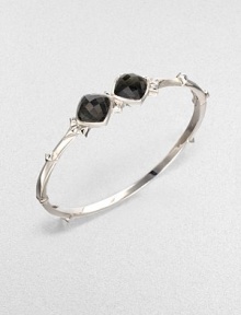 From the Superstud Collection. Two diamond-shaped faceted cushions of clear quartz layered over faux cat's eye create a dramatic look in a bangle of bright sterling silver dotted with pointy studs.Synthetic cat's eye and clear quartzRhodium-plated sterling silverDiameter, about 2.25Box-and-tongue claspImported