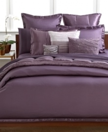 A modern look rooted in luxe simplicity, this Haze sham from Donna Karan features a rich purple tone with a lustrous sheen. Finished with pure silk trim. Button closure.