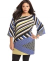 A unique mix of prints livens up Alfani's three-quarter sleeve plus size tunic top-- finish the look with leggings.