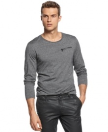 Here's the scoop: low necklines are in. Don the coolest current trend with this t-shirt from Calvin Klein.