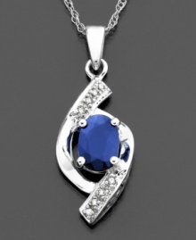 Artistry meets elegance in this beautiful oval swirl pendant featuring oval-cut sapphire (3/4 ct. t.w.) and round-cut diamond accents set in 14k white gold. Approximate length: 18 inches. Approximate drop: 1 inch.