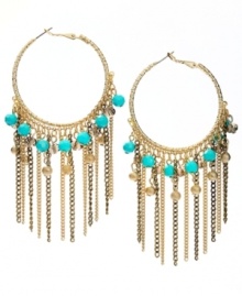 INC International Concepts take traditional hoops to a whole, new level. Trendy fringe and plastic turquoise beading mixed with diamond dust beads and glass rondelles create a head-turning style. Set in mixed metal. Approximate drop: 2-1/4 inches.