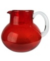 The eye-catching Iris pitcher makes a big impact in any setting with a bold ruby hue and tiny bubbles trapped in dishwasher-safe glass. From Artland's serveware collection.