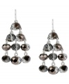 Moody shimmer. Kenneth Cole New York's trendy chandelier earrings feature drops of hematite glass cherry beads. Crafted in silver tone mixed metal. Approximate drop: 1-3/4 inches.