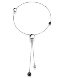 Simple and sophisticated. Add a modern edge to your style with Breil's Chaos lariat necklace. Featuring adjustable spheres, it's made in silver tone stainless steel with natural black stones. Approximate length: 28 inches.