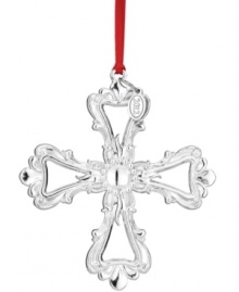 With an elegance that extends well beyond the holidays, Reed & Barton's silver-plated cross ornaments your tree, wall or window with timeless grace. A 2012 hang tag marks the occasion.