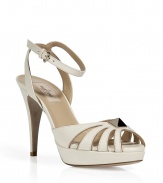 Channel refined style in these ultra-luxe leather sandals from Valentino - Cut-out detailed front with silver-tone stud, front platform and high heel, ankle strap closure - Style with a flirty floral dress for off-duty glam or a fitted pencil skirt for workweek chic