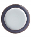 A true gem, these Amethyst wide-rimmed dinner plates are simply glazed, but boldly hued, in deep indigo and crisp white from Denby's collection of dinnerware. The dishes can embrace their luxe color alone or they can be paired with the playful dots of Amethyst Stone for a well-balanced and uniquely customized table setting.