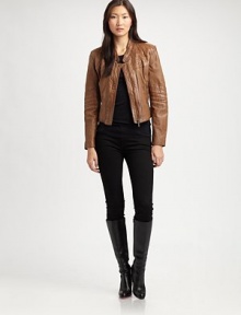 Featuring intoxicating seam details, this vintage-inspired lambskin-leather jacket is a neutral must-wear this season. Stand collarFront zipperZipper pocketsIntriguing seamsFully linedAbout 22 from shoulder to hemLambskin leatherDry clean by leather specialistImported Model shown is 5'11 (180cm) wearing US size Small. 