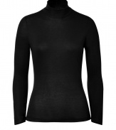 Sleek long sleeved top in black rayon and wool - Wonderfully soft and comfortable - Narrow silhouette with feminine turtleneck and short zip at the nape - A favorite basic perfect for layering or wearing solo - Team with skinny jeans, narrow skirts or wide-legged pants