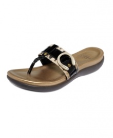 Walk away in comfortable style. The mtallic buckles add shine to the Mykos thong sandals by Circa by Joan and David.