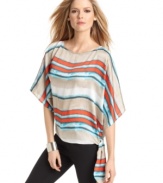 With bright stripes, this MICHAEL Michael Kors top features an on-trend slouchy shape and self tie -- perfectly paired with the season's skinny jeans!